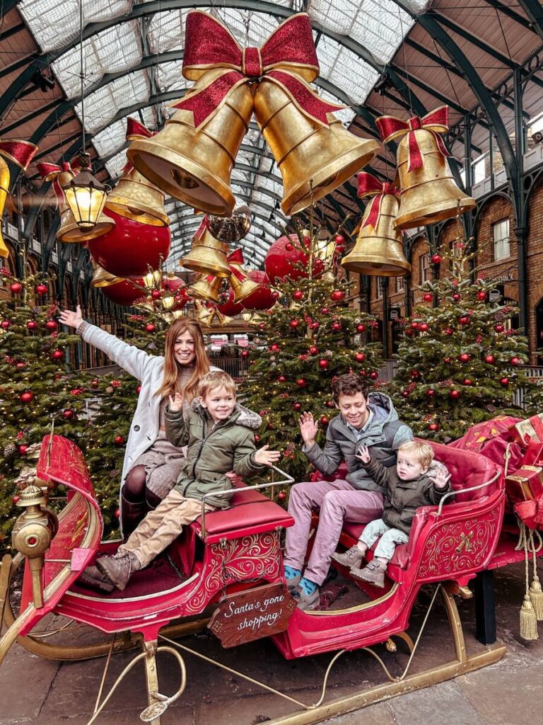 A giant red sleigh in Covent Garden, the perfect photo opportunity when spending Christmas in London. 