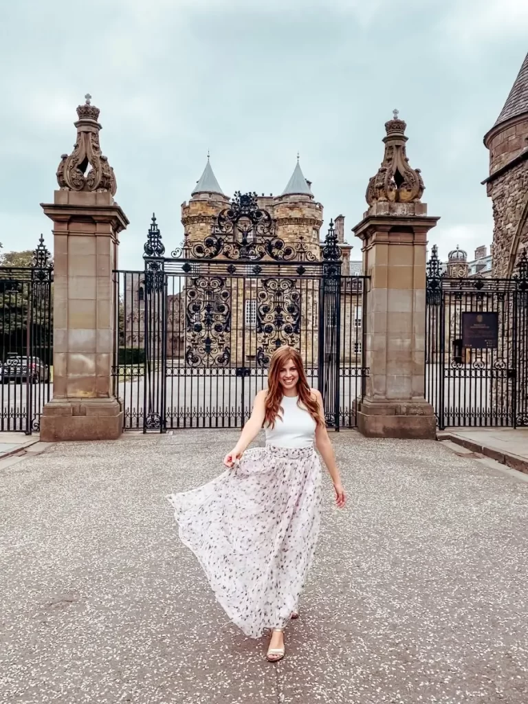 Outside the gates of The Palace of Holyroodhouse, one of the great things to do in Edinburgh.
