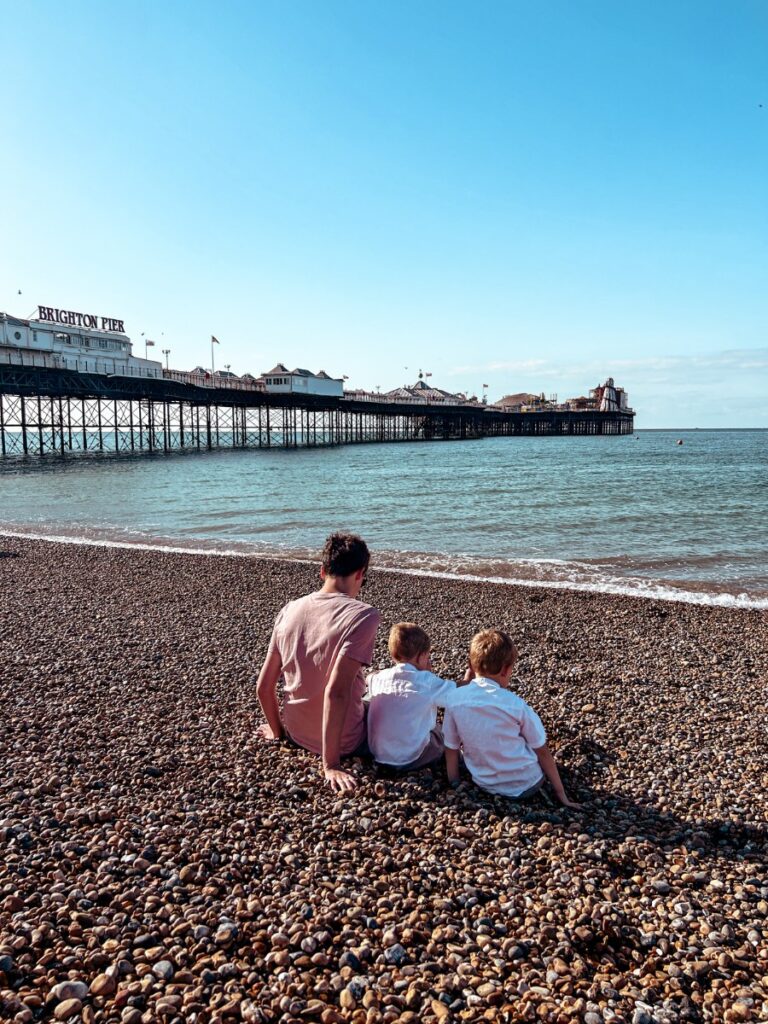Sat looking out over the sea from Brighton Beach.