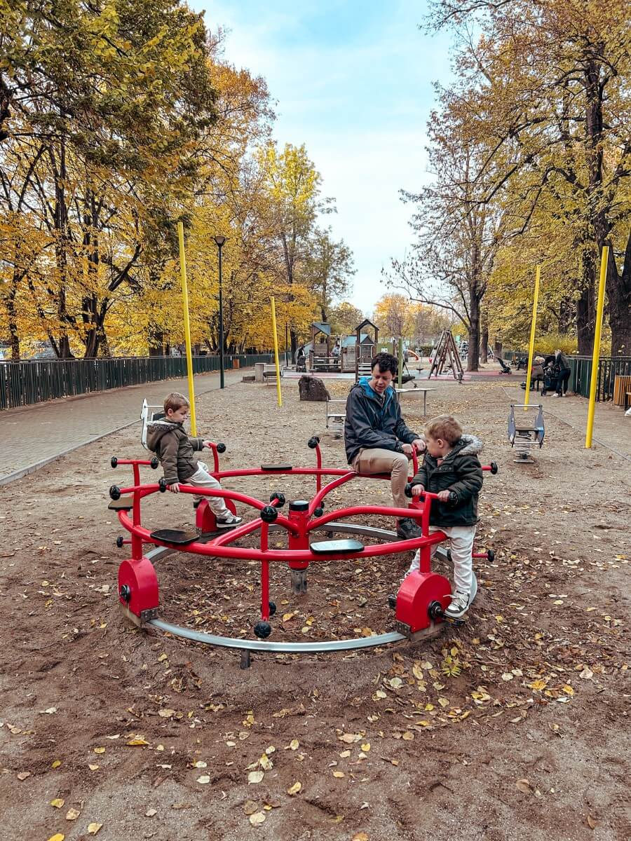 Playing on Children's Island Playground, one of the best things to do in Prague with kids.