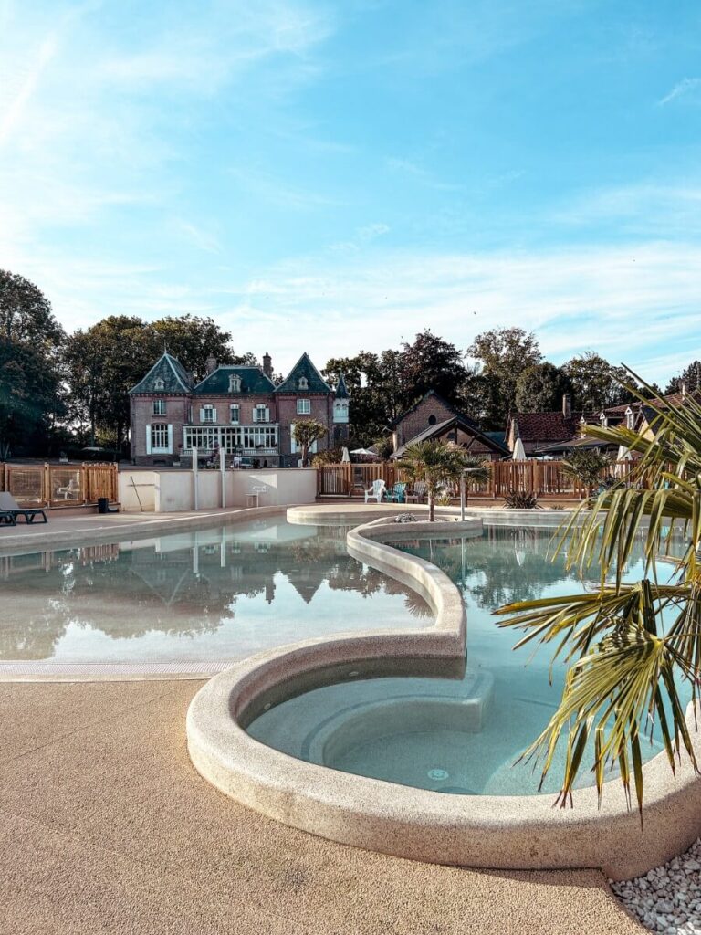The main swimming pool with jacuzzi area, lazy river and gorgeous views of the chateau.