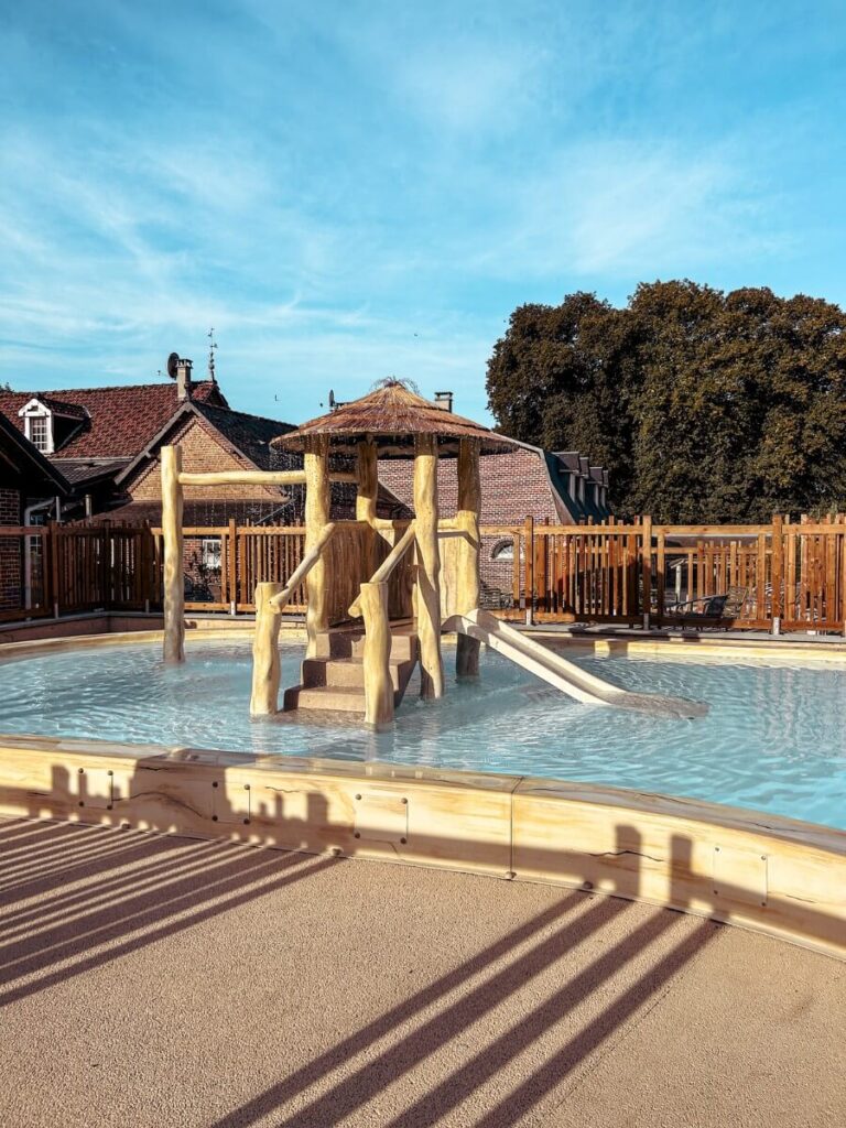 The Outdoor Children's pool at Yelloh! With cute slide and water feature. 