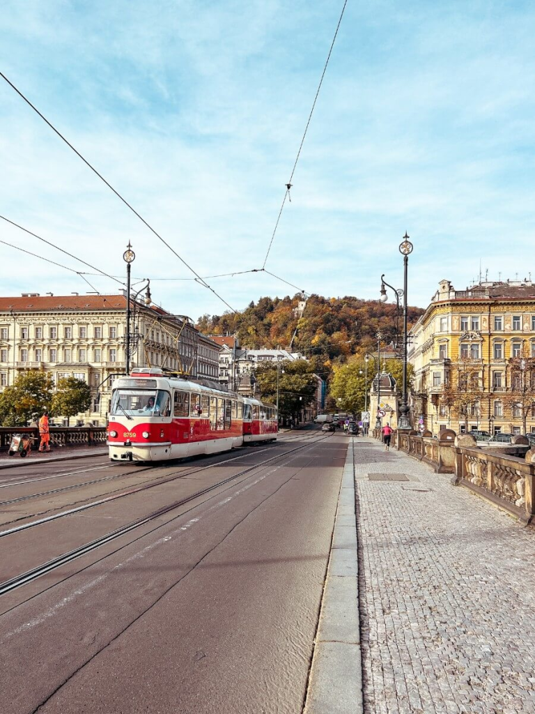 View of an old tram and Petřín Hill in Prague.