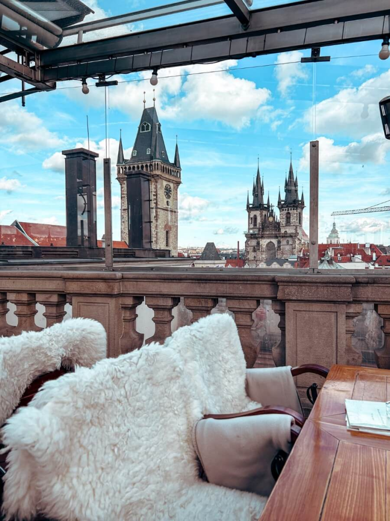 Cozy seats and beautiful views from the Teresa U Prince Rooftop Bar in Prague.