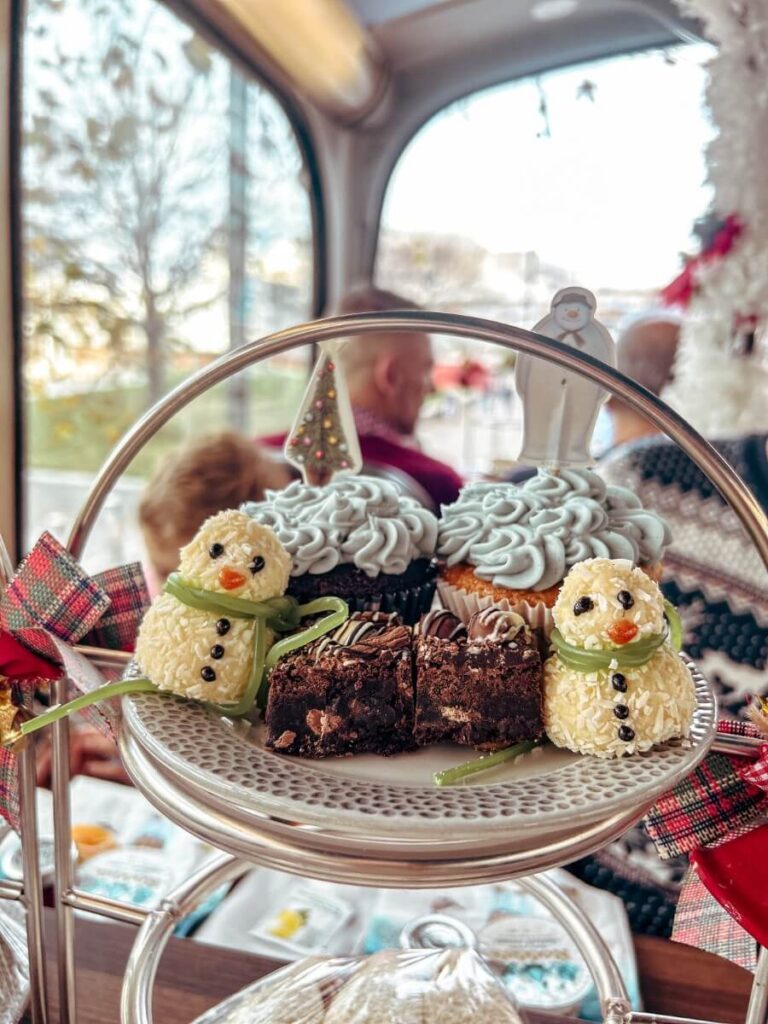 Snowman themed sweet treats on the Christmas afternoon tea bus tour in London