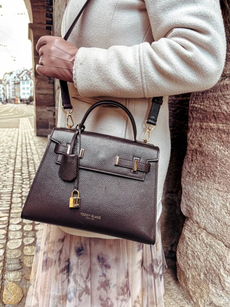 The Teddy Blake Ava Handbag. A perfect choice for your winter travel capsule wardrobe.