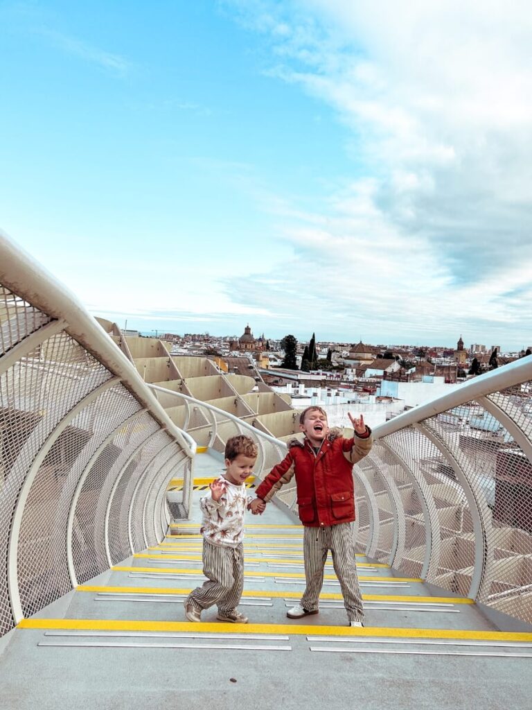 Kids enjoying Setas de Sevilla in Seville Spain.