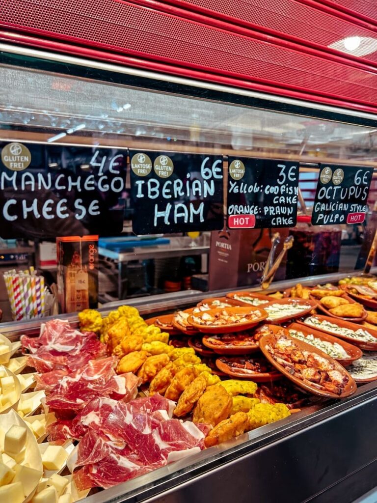Tapas for sale in Mercado de Tirana, a local neighbourhood in Seville