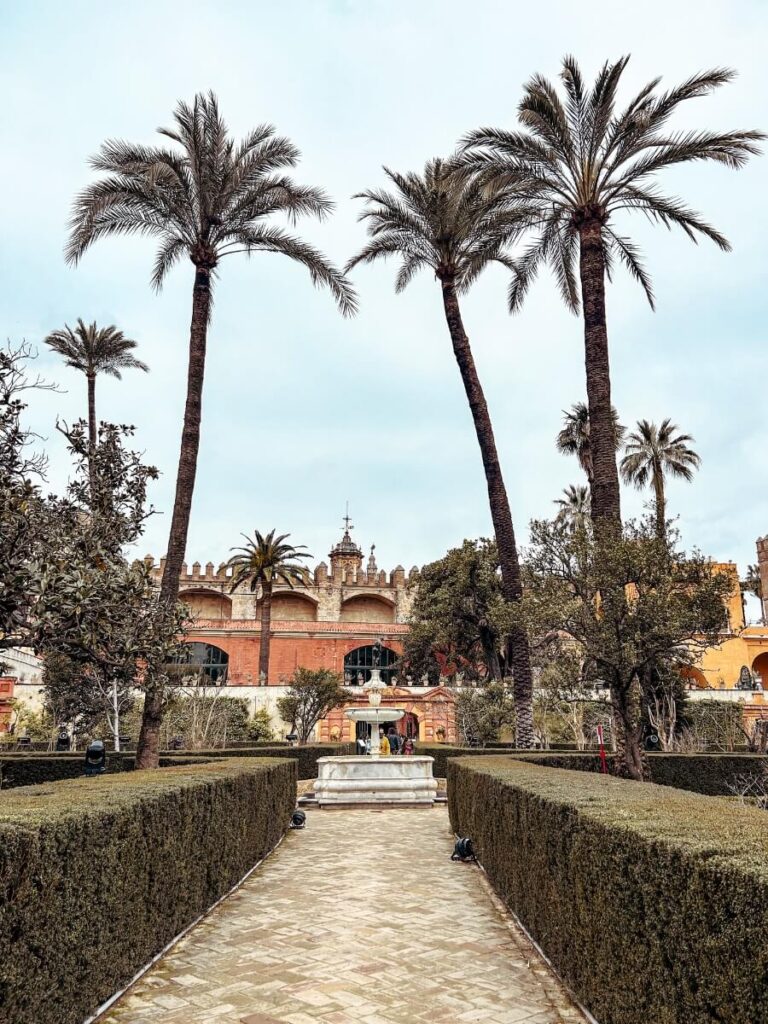 Beautiful grounds of the Royal Alcázar of Seville. A must visit in Seville with kids. 
