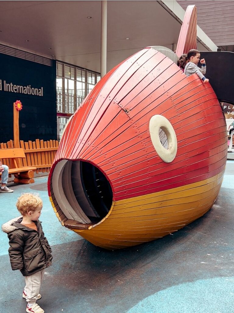 The huge fish sculpture in Biodiversity Playground Stratford, one of the best playgrounds in London.