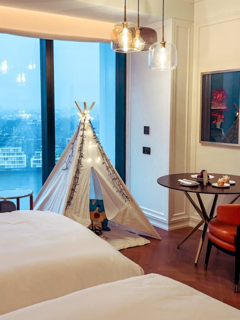 A twin Room with river view set up for kids at Park Hyatt River Thames London