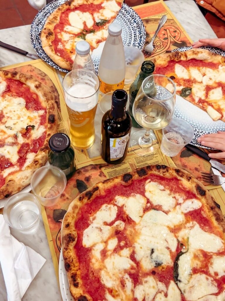 Delicious pizza and wine at Pizzeria Vesi, Napoli