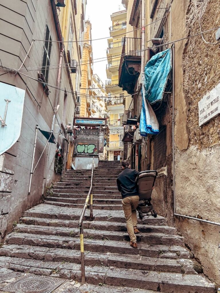Getting around the Historic Centre of Naples with kids meant carrying our pushchair up some steps.