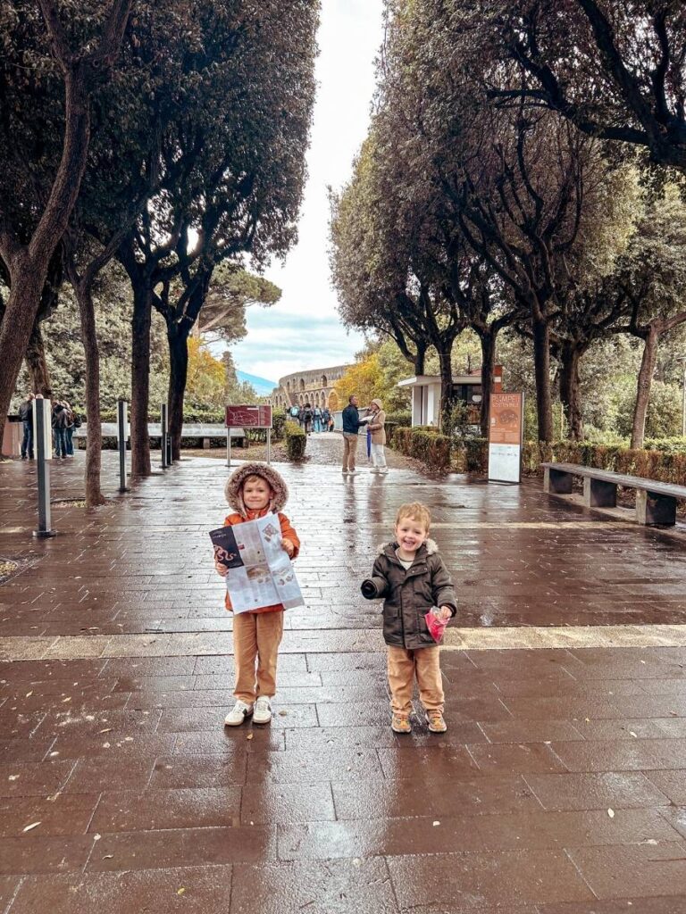 Kids at the entrance with their map, ready to explore Pompeii.
