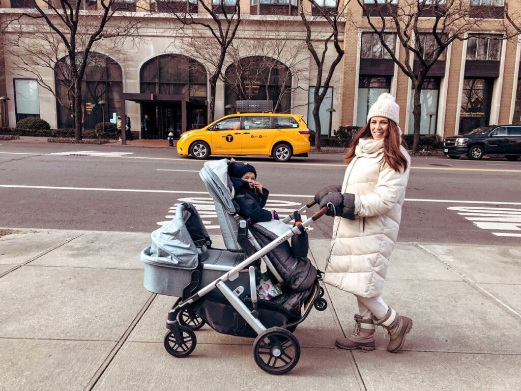 Mum in the City walking in NYC with her baby and toddler kids in the stroller. 