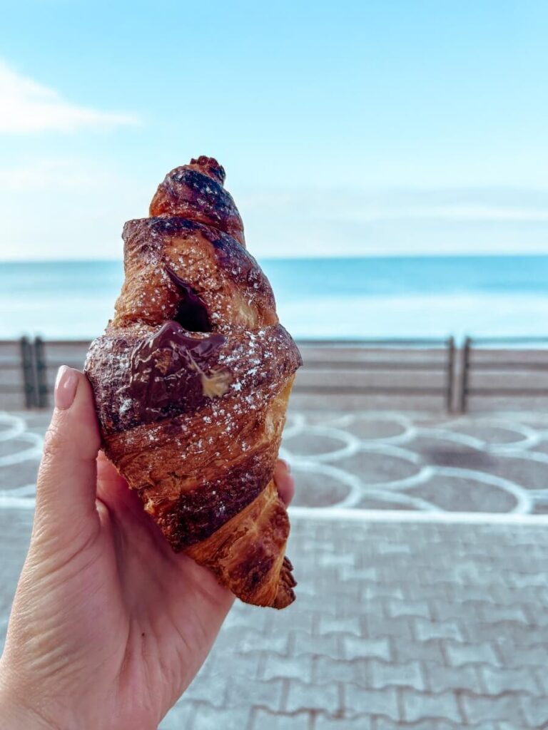 Enjoying Croissant for breakfast by the sea in Maiori was a fun things to do. 