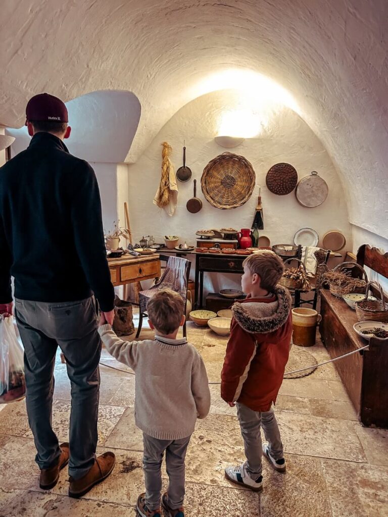 Looking at the kitchen area inside the Trullo Sovrano Museum. 