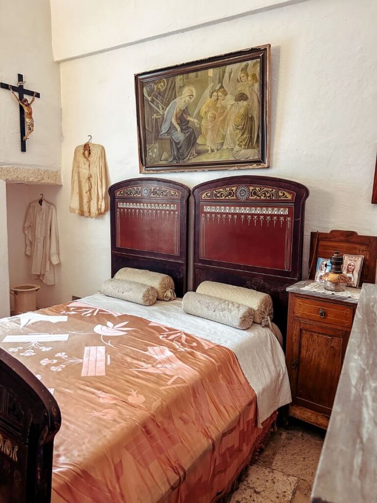 A historic bedroom set up in  Trullo Sovrano, showing what life was like in Alberobello hundreds of years ago.