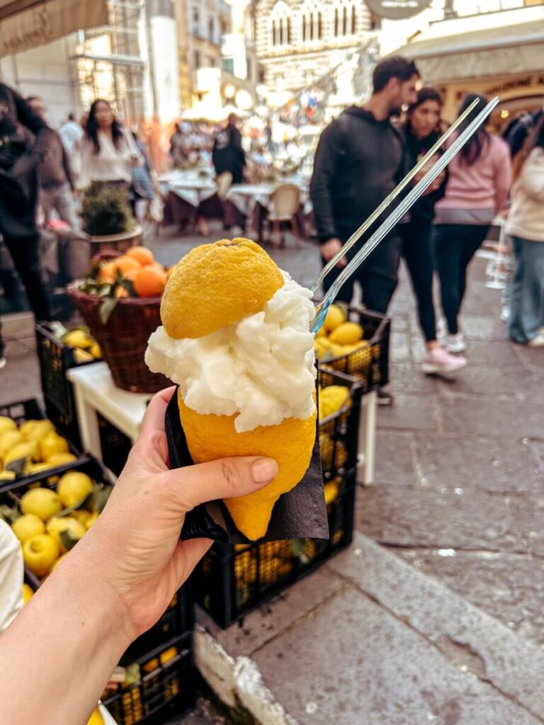 Eating Lemon Gelato served in a lemon is a top thing to do on the Amalfi Coast. 