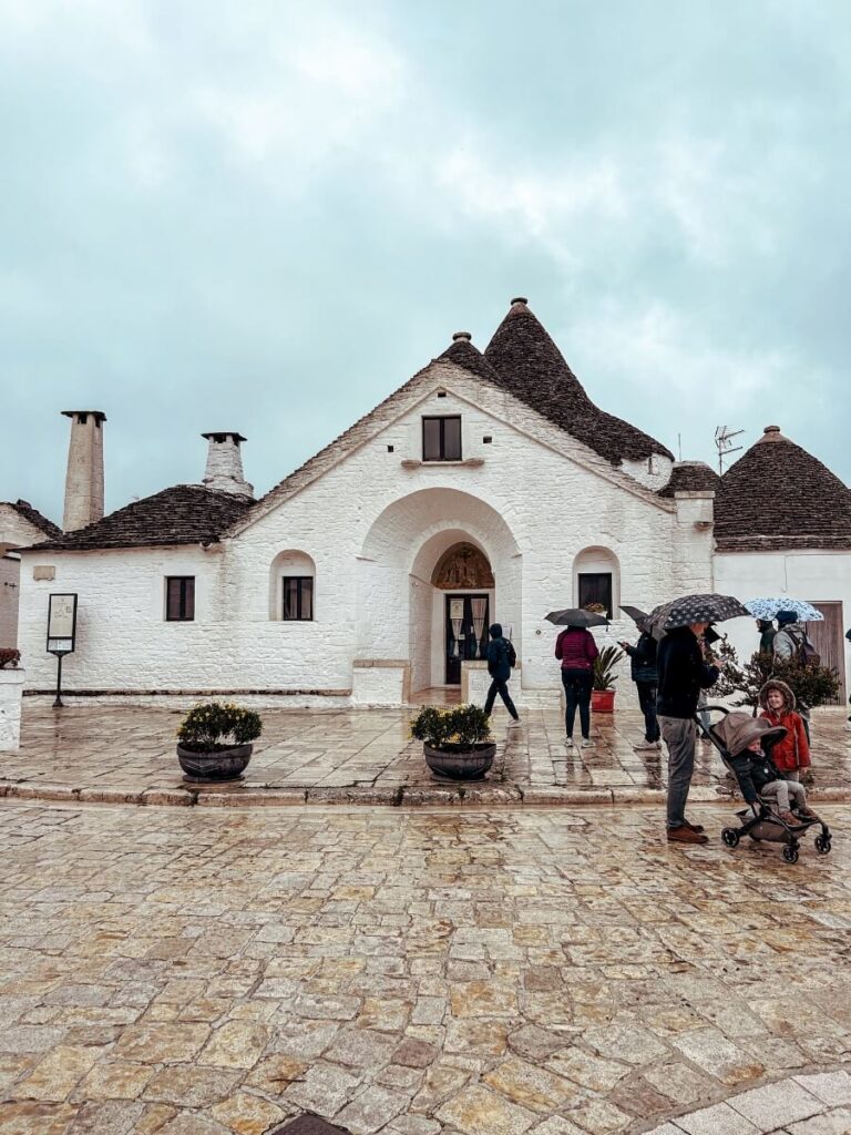 Outside Trullo Sovrano, a museum showing what life was like living in a trulli many years ago and an interesting thing to do in Alberobello.