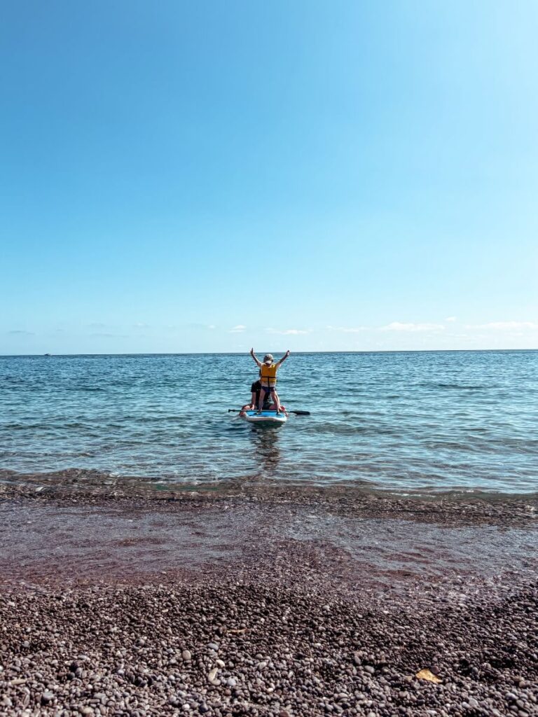 Paddleboarding or kayaking is a really fun thing to do on the Amalfi Coast with kids. 