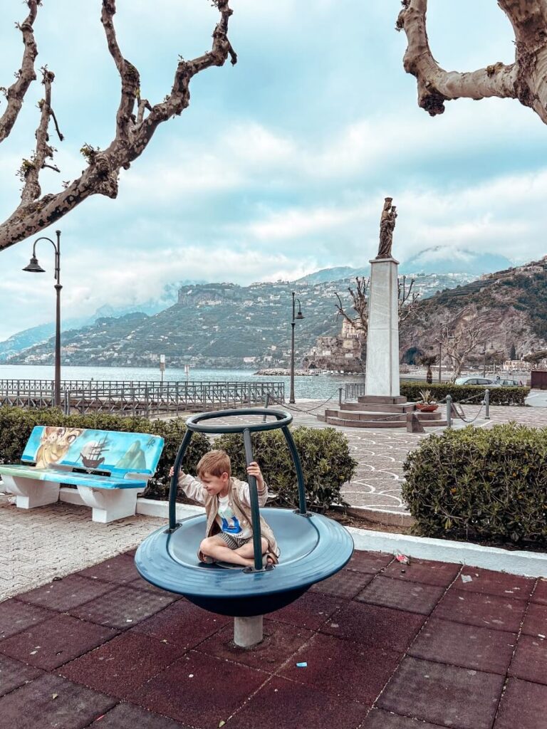 Playing in Parco giochi Maiori, a fun thing to do when visiting the Amalfi Coast with kids.