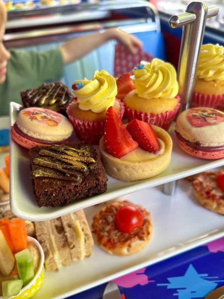 The selection of sandwiches and treats on the Paw Patrol bus. One of the best children's afternoon teas in London. 