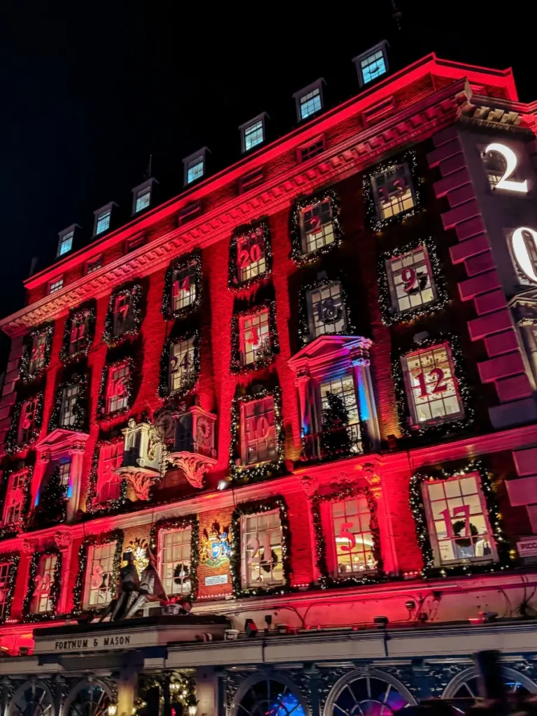 The exterior of Fortnum & Mason lit up at Christmas